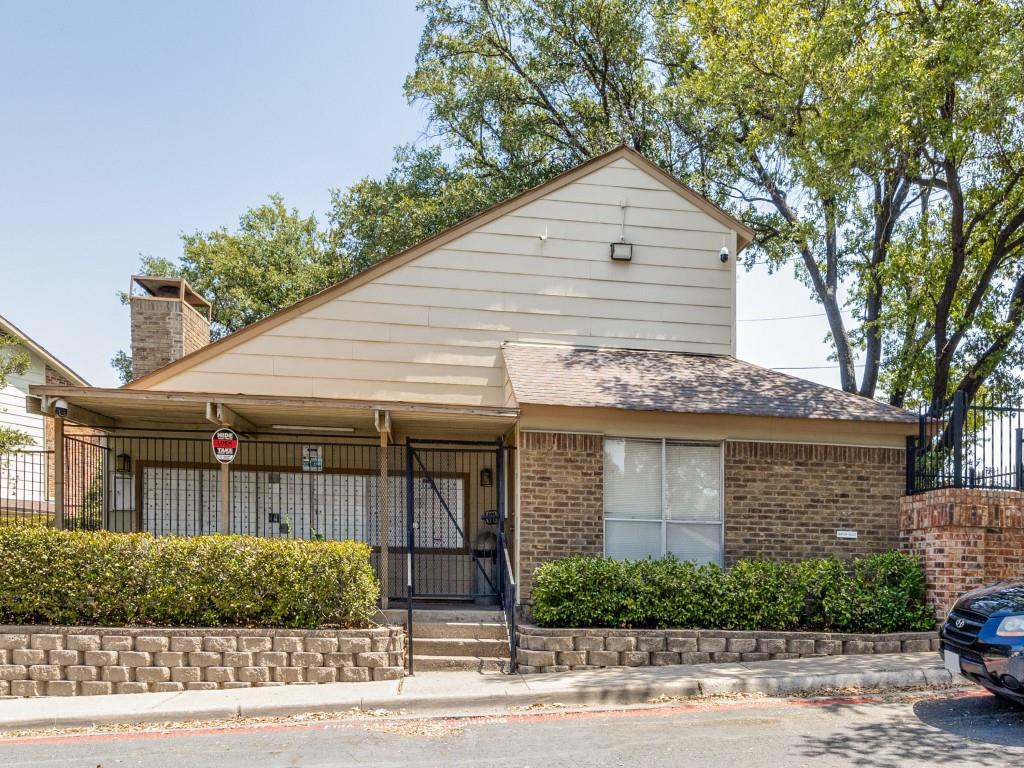 11311 Audelia Road, Unit 221 Dallas, TX 75243 - Photo 19 of 22 a front view of a house with a garden
