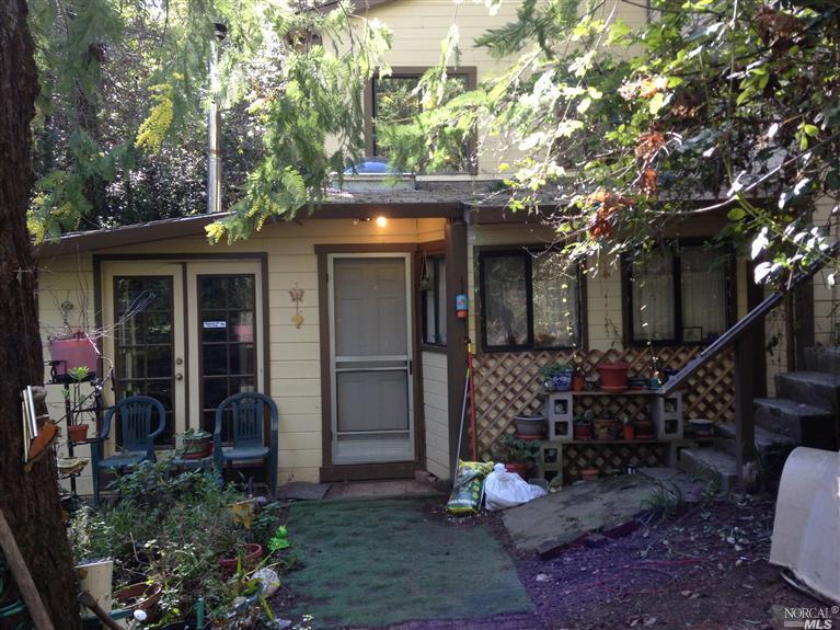9340 Rio Vista Road Forestville, CA 95436 - Photo 1 of 1 a front view of a house with plants
