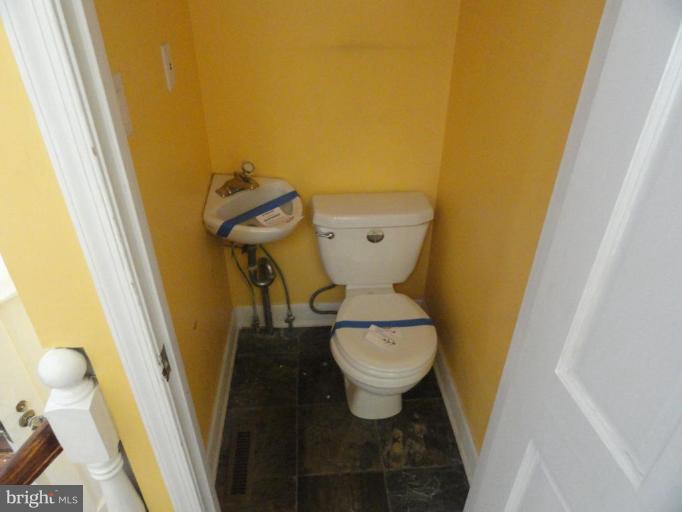 404 North Rock Glen Road Baltimore, MD 21229 - Photo 9 of 9 Half Bath 1