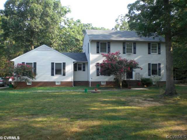 2240 Mill Road Henrico, VA 23231 - Photo 1 of 10 a front view of house with yard and green space
