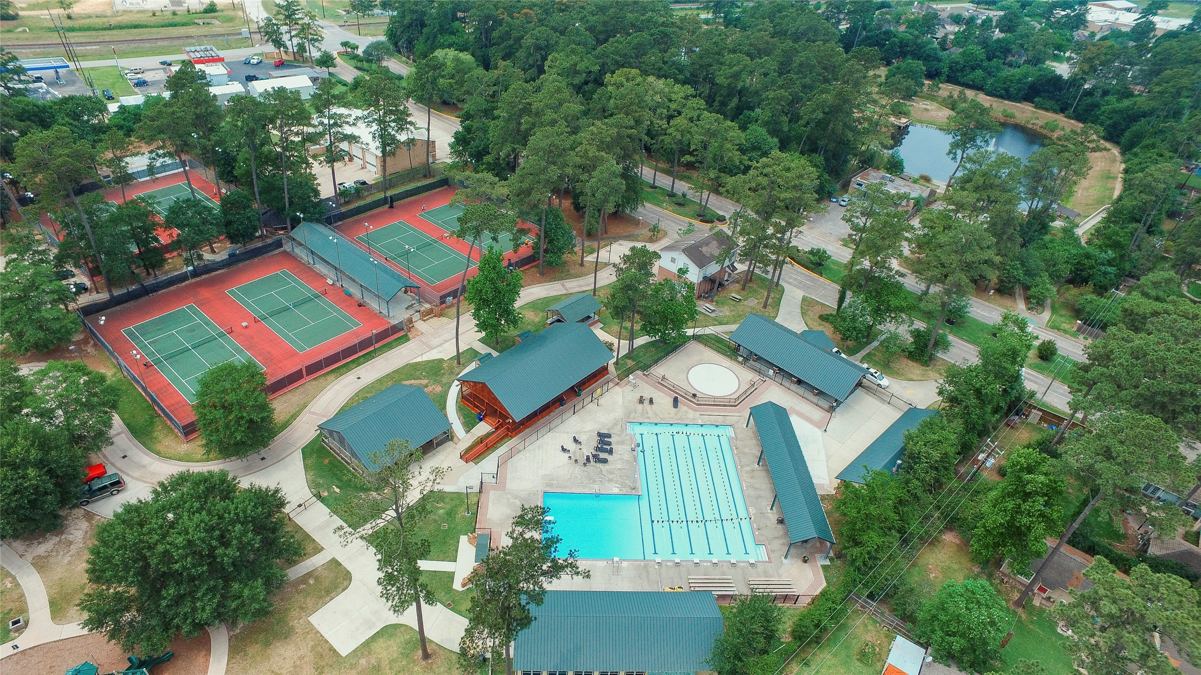 6407 Craigway Road Spring, TX 77389 - Photo 39 of 47 The Northampton amenities park offers a pool, kiddie pool, tennis courts, and a playground.