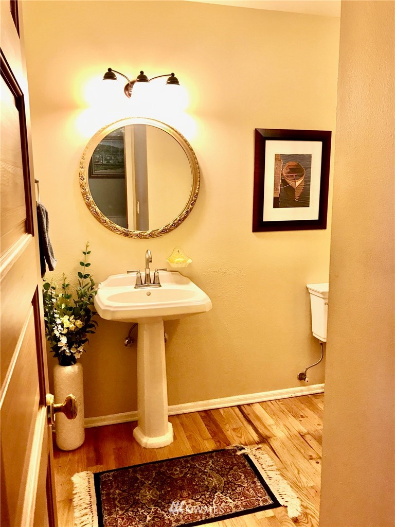 6815 Skipley Road Snohomish, WA 98290 - Photo 16 of 36 a bathroom with a sink and a mirror