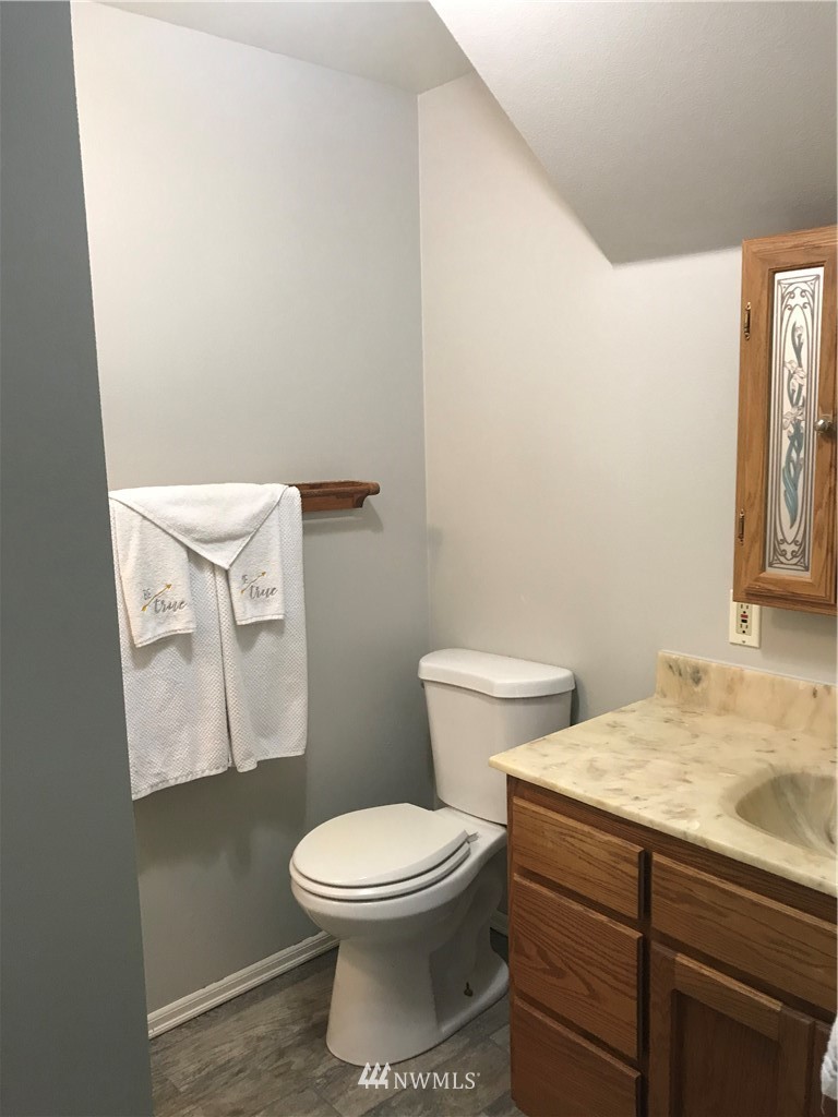 6815 Skipley Road Snohomish, WA 98290 - Photo 26 of 36 a bathroom with a toilet and a sink