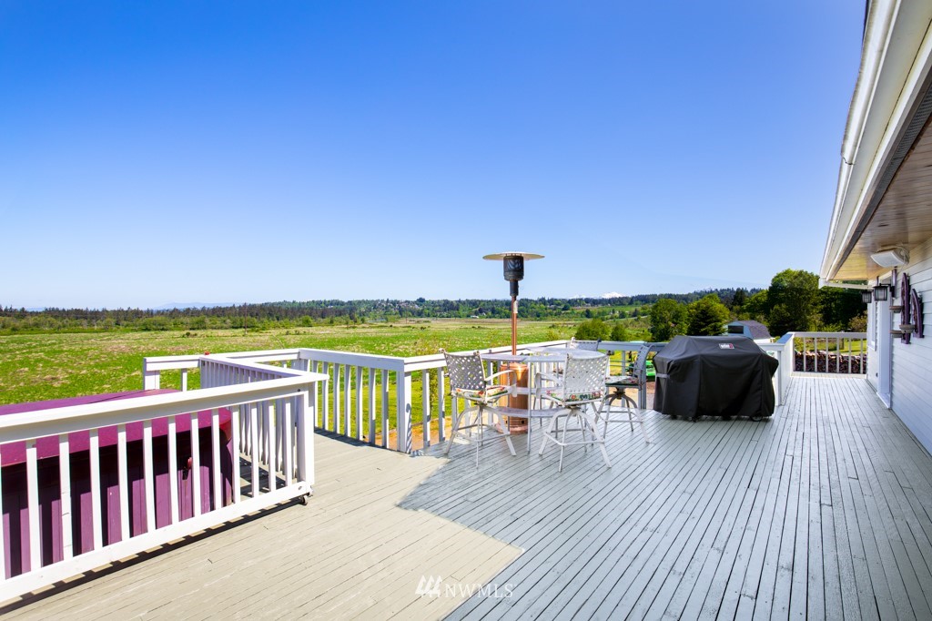 6815 Skipley Road Snohomish, WA 98290 - Photo 28 of 36 a view of roof deck with patio and ocean view
