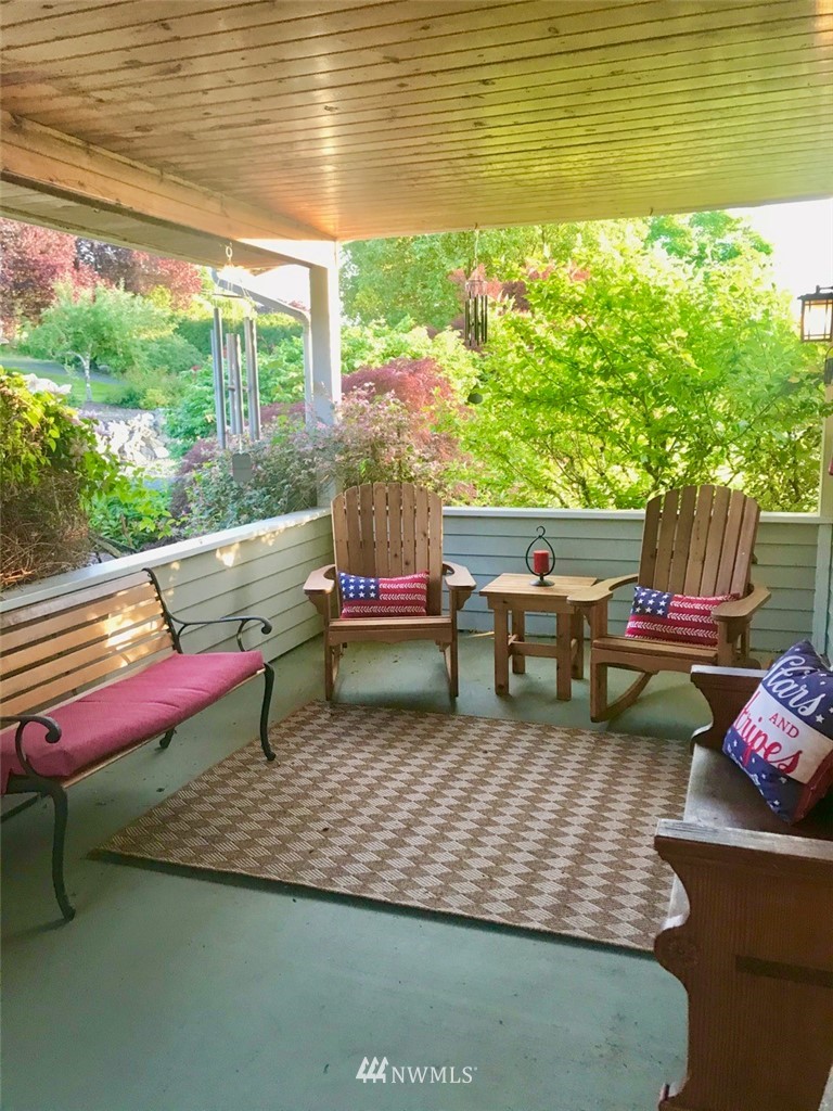 6815 Skipley Road Snohomish, WA 98290 - Photo 7 of 36 a backyard of a house with yard and outdoor seating