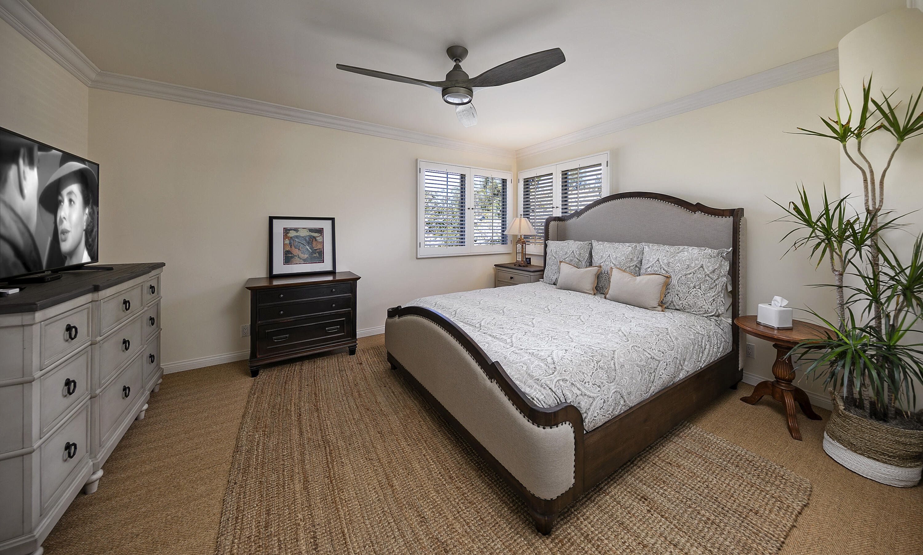 1138 Hill Road Santa Barbara, CA 93108 - Photo 13 of 25 a spacious bedroom with a bed and a flat screen tv