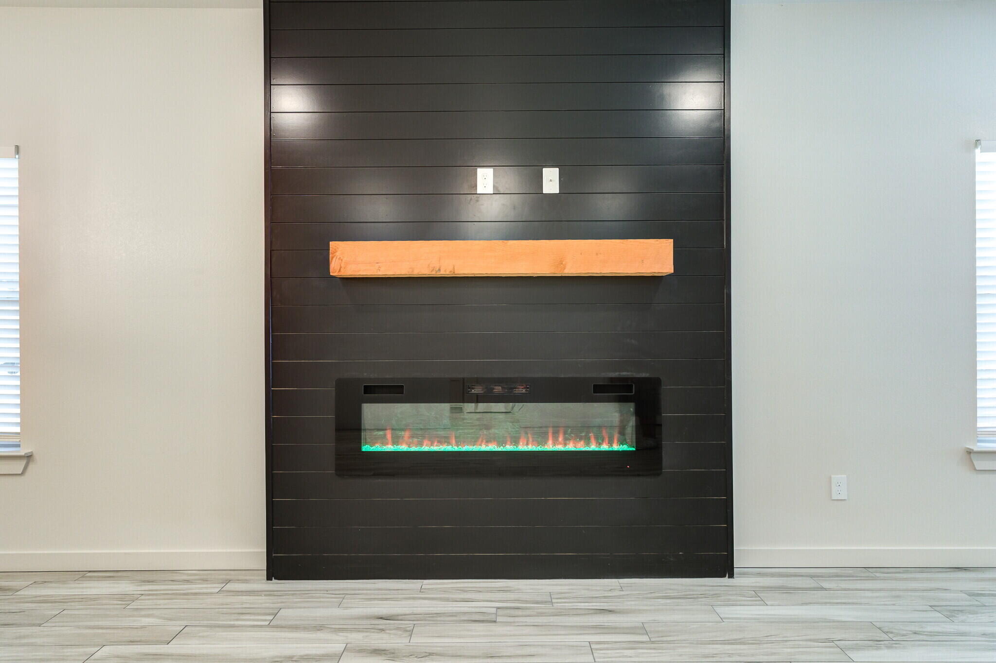 7030 41st Street Lubbock, TX 79407 - Photo 14 of 44 a living room with a fireplace