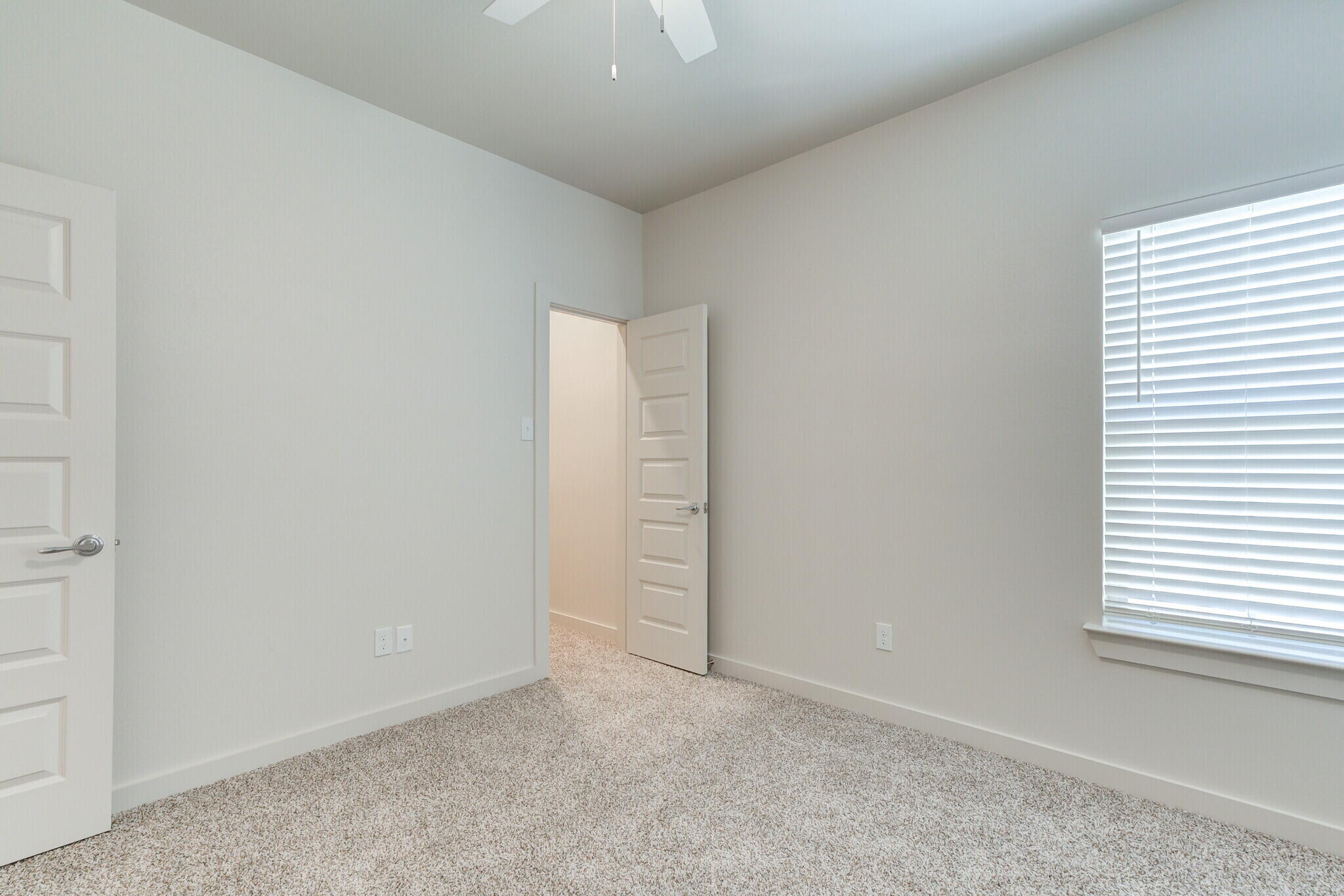 7030 41st Street Lubbock, TX 79407 - Photo 28 of 44 an empty room with windows