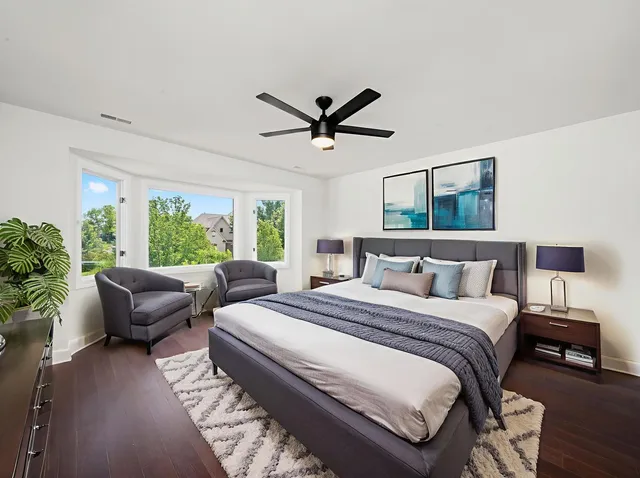 a bathroom with a toilet a sink and glass door