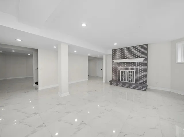 a view of a two chairs on the deck