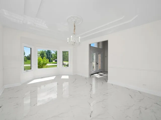 a large white building with kitchen view