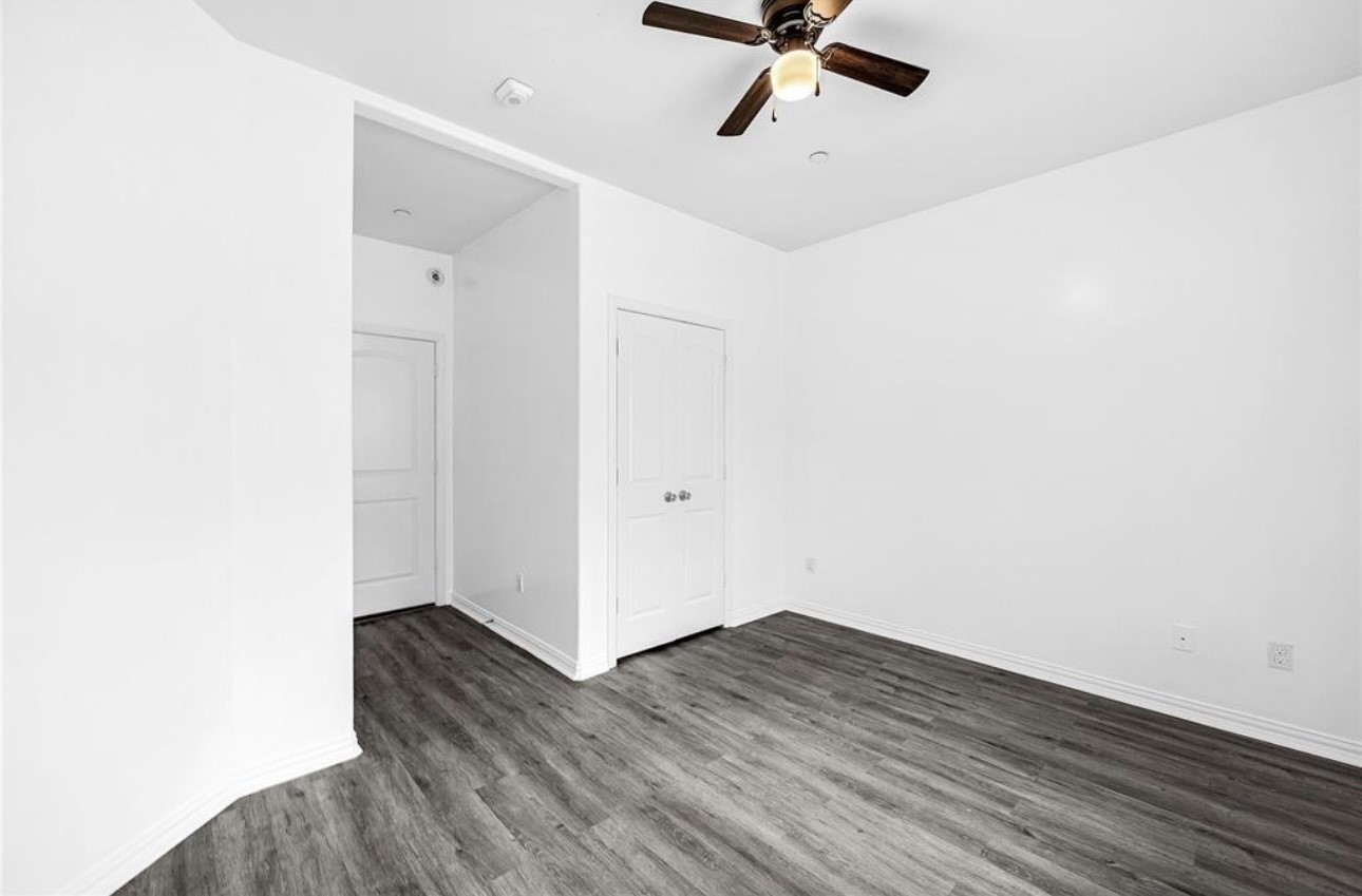 6122 West Mt Houston Road, Unit 4 Houston, TX 77088 - Photo 5 of 11 a view of a room with wooden floor