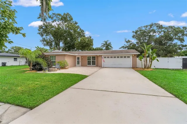 a view of a backyard with a garden