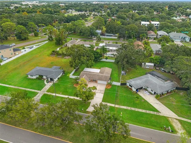 a view of a park with chairs