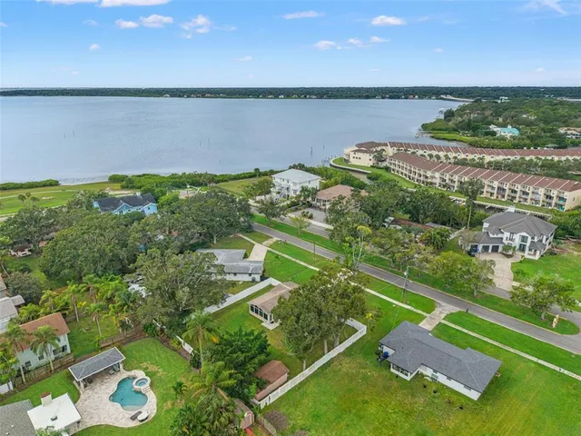 a view of balcony with wooden floor