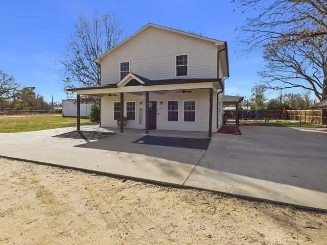 a front view of a house with garage