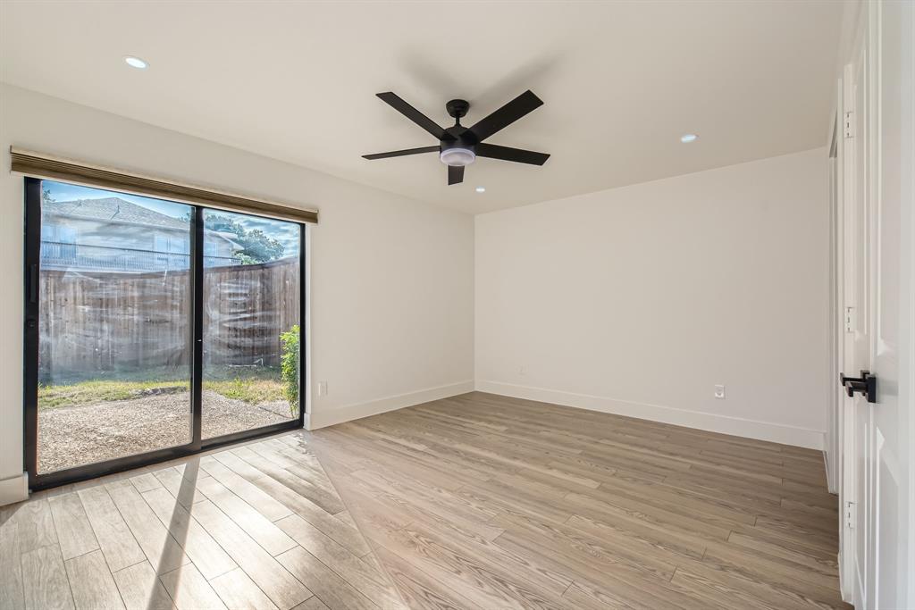 16212 Spring Creek Road Dallas, TX 75248 - Photo 19 of 27 a view of an empty room with a window