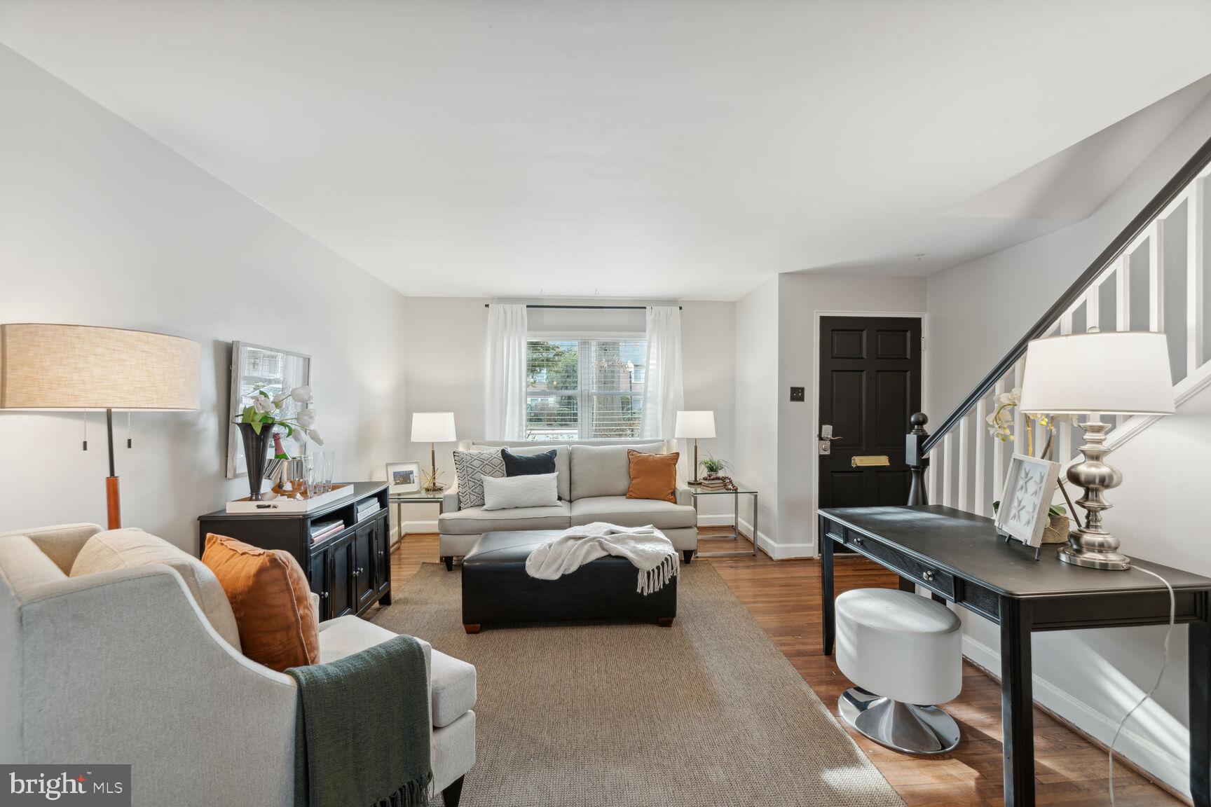 2913 16th Road South, Unit B Arlington, VA 22204 - Photo 2 of 23 a living room with furniture and a lamp
