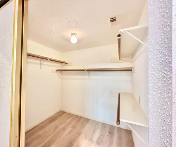 a bathroom with a bathtub and a sink