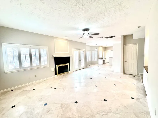 a bathroom with a sink a toilet a mirror and vanity