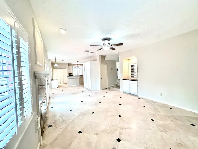 a view of hallway with wooden floor