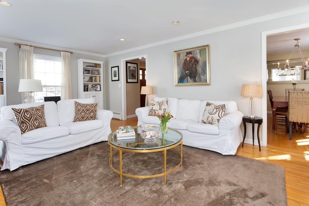 23 Hollow Tree Ridge Road Darien, CT 06820 - Photo 9 of 25 a living room with furniture and a potted plant