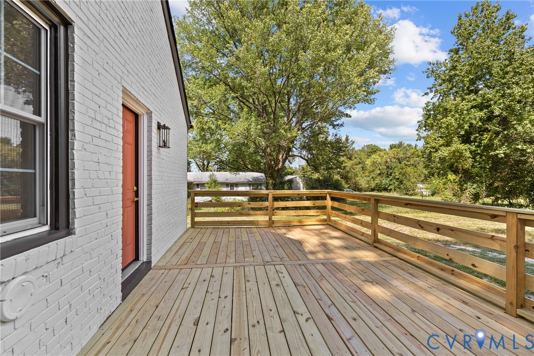 821 Fort Lee Road Petersburg, VA 23803 - Photo 33 of 45 Expansive wood deck with a natural wood railing, w