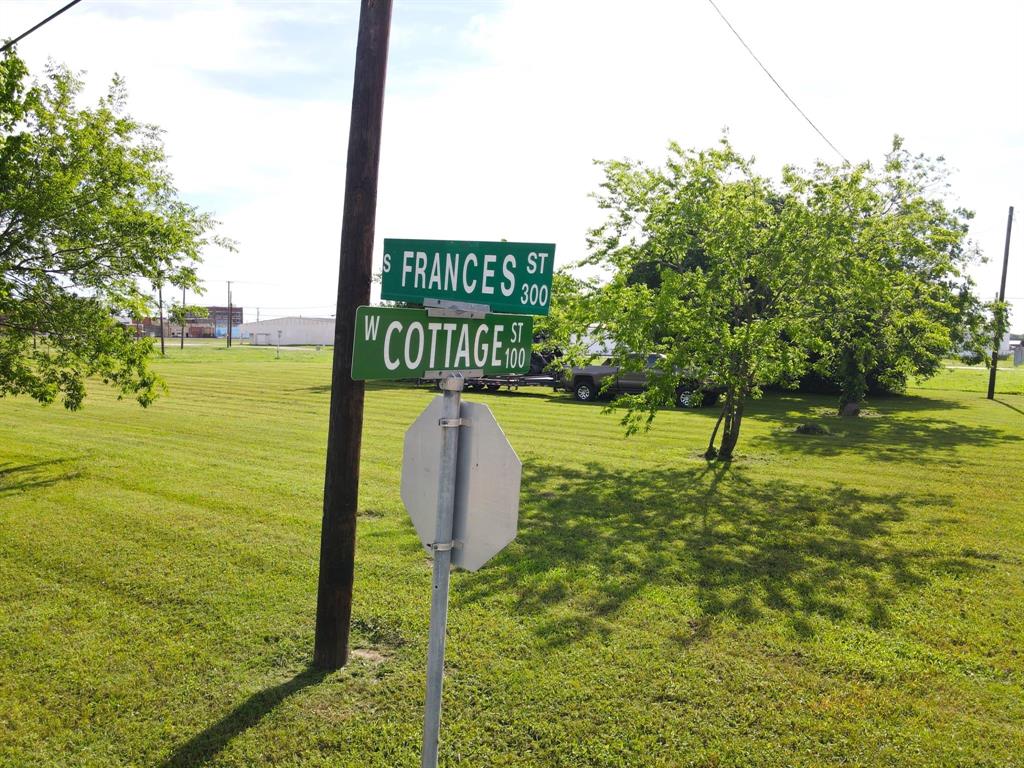 a sign board with ocean view