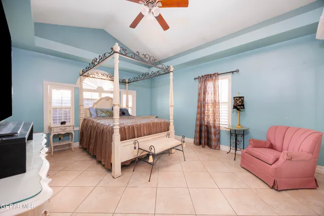 a bedroom with furniture and a couch