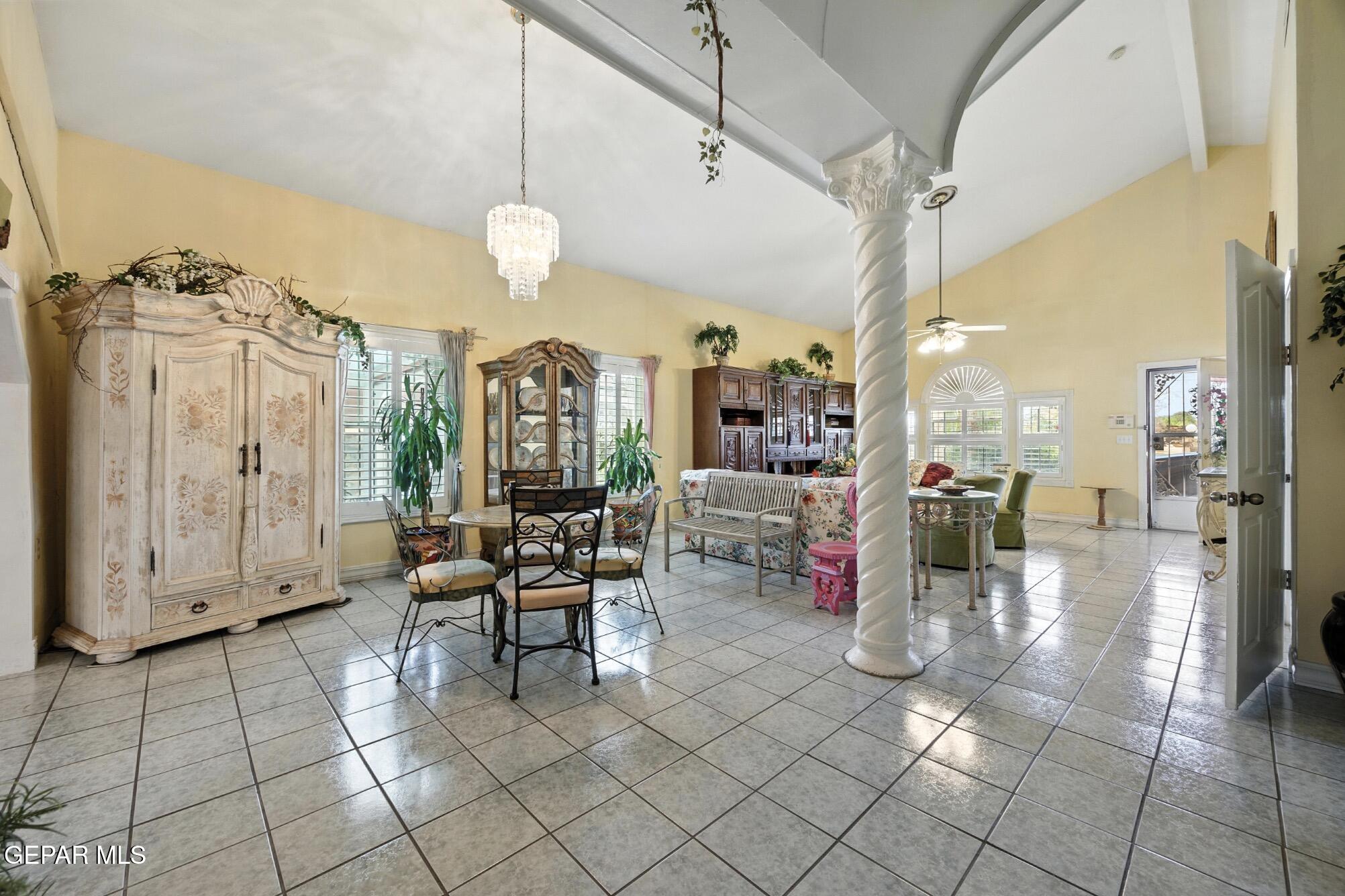 190 Polo Inn Road El Paso, TX 79915 - Photo 12 of 58 a view of a livingroom with furniture and a chandelier