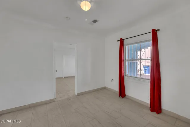 a bathroom with a sink toilet and mirror