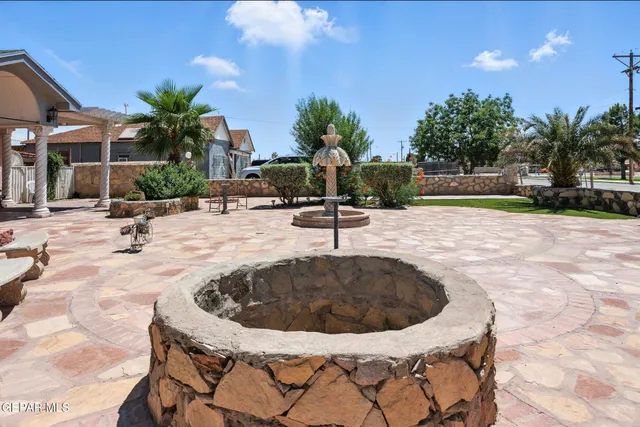 a view of a swimming pool with a lounge chair