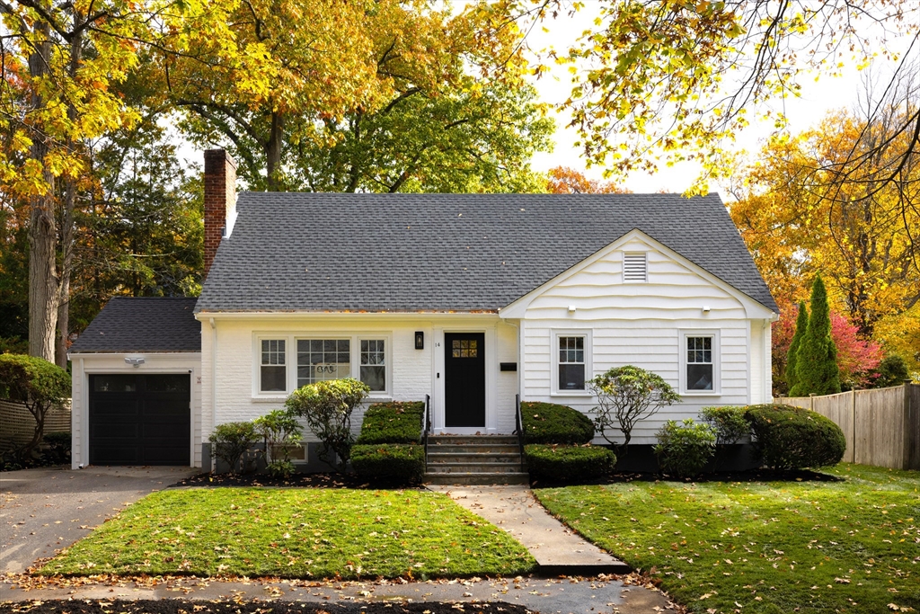 front view of a house and a yard