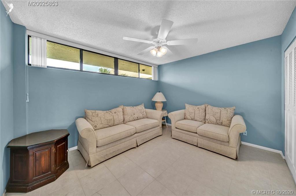 1950 Southwest Palm City Road, Unit 13305 Stuart, FL 34994 - Photo 21 of 28 a living room with furniture