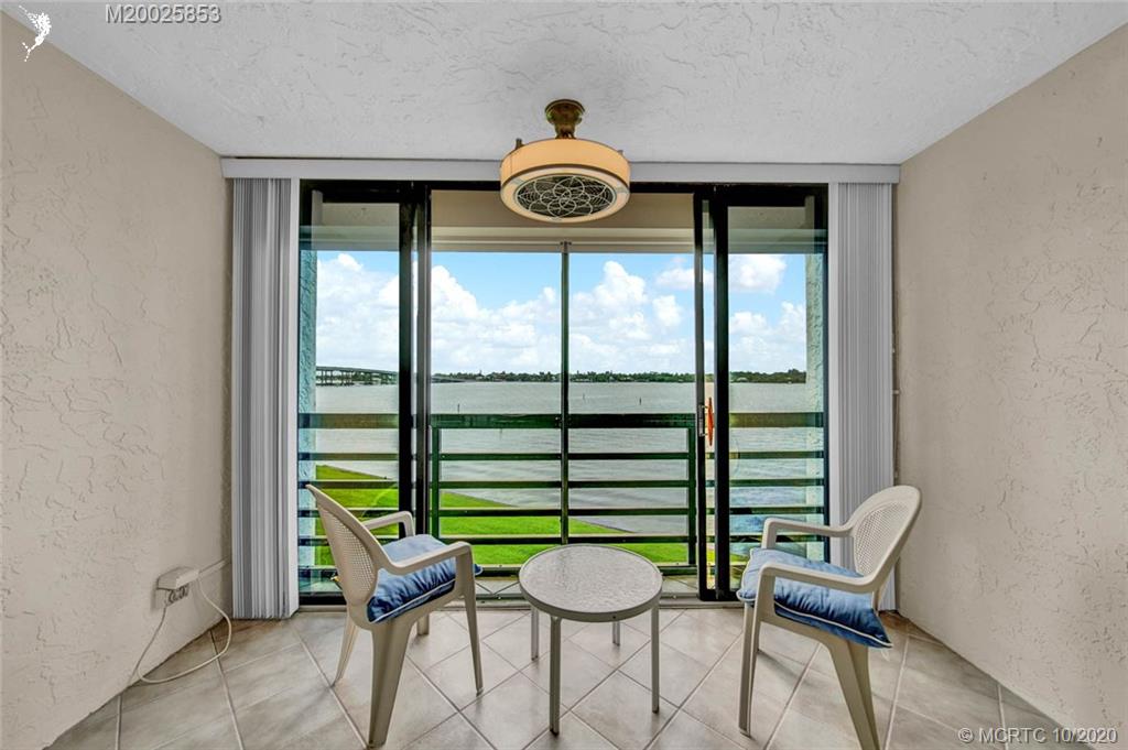 1950 Southwest Palm City Road, Unit 13305 Stuart, FL 34994 - Photo 25 of 28 a view of a chairs and table in a room