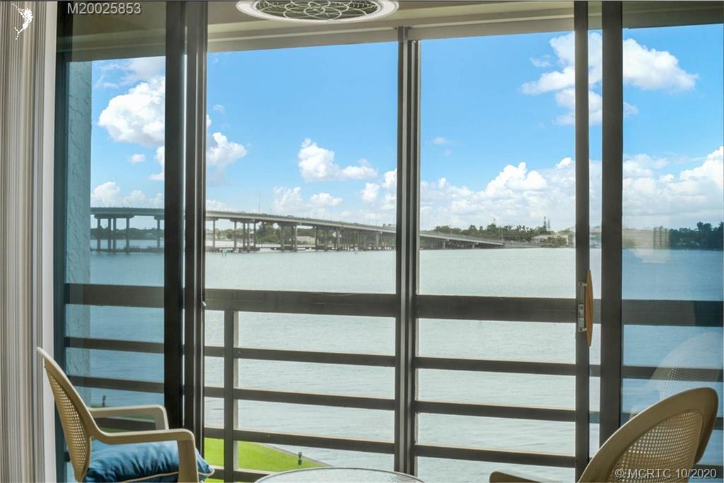 1950 Southwest Palm City Road, Unit 13305 Stuart, FL 34994 - Photo 28 of 28 a view of a glass door with a view from window