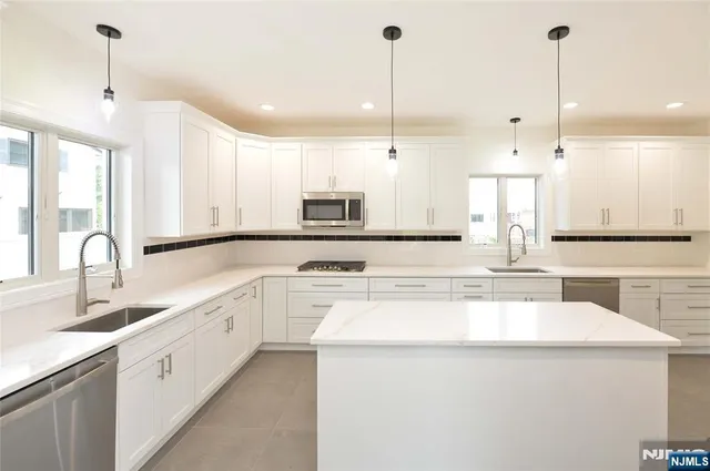 a large kitchen with cabinets