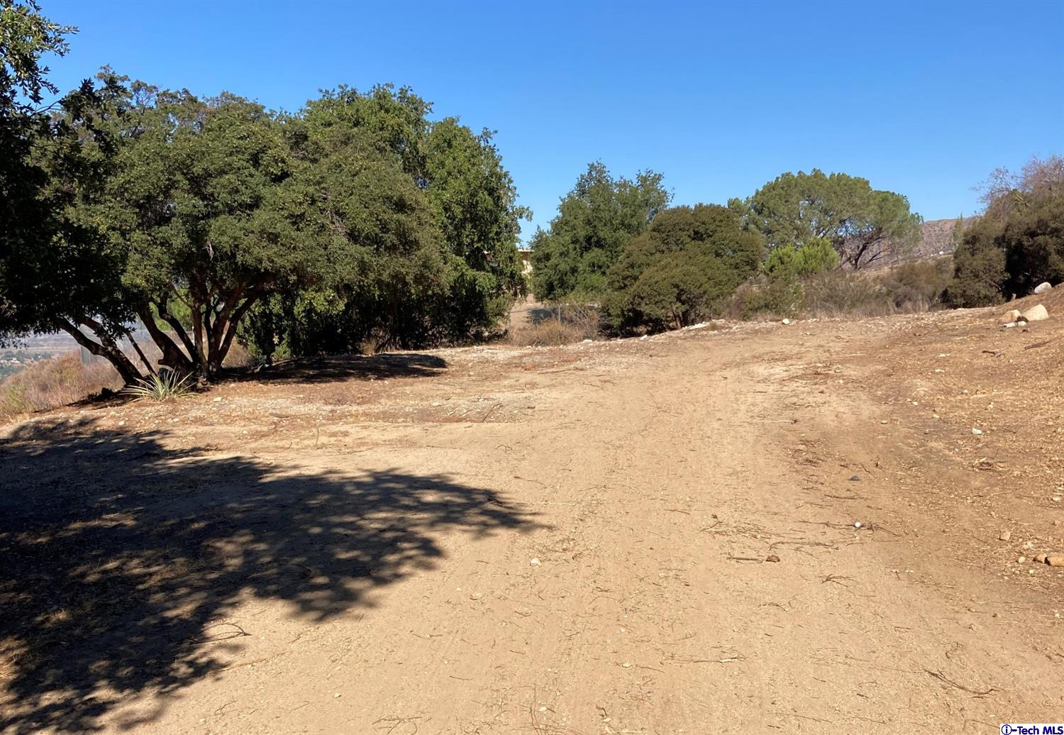 6835 Grenoble Street Tujunga, CA 91042 - Photo 2 of 13 a view of a yard covered in snow