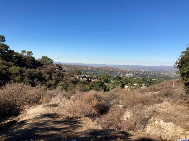 a view of lake with mountain