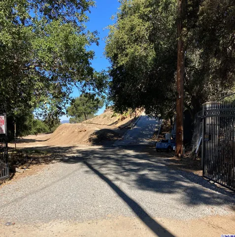 a view of a backyard of a house