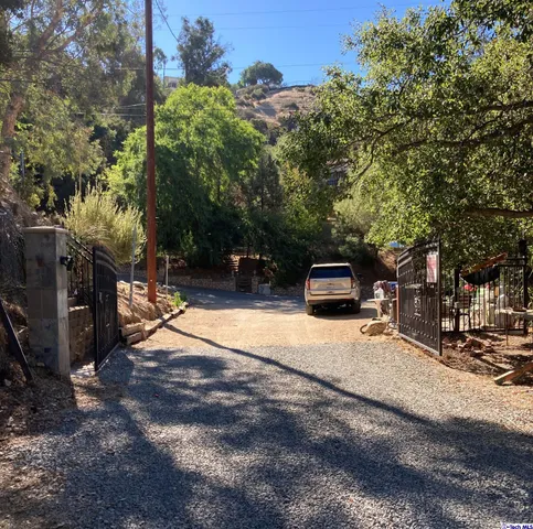 a view of yard covered with snow in outdoor space