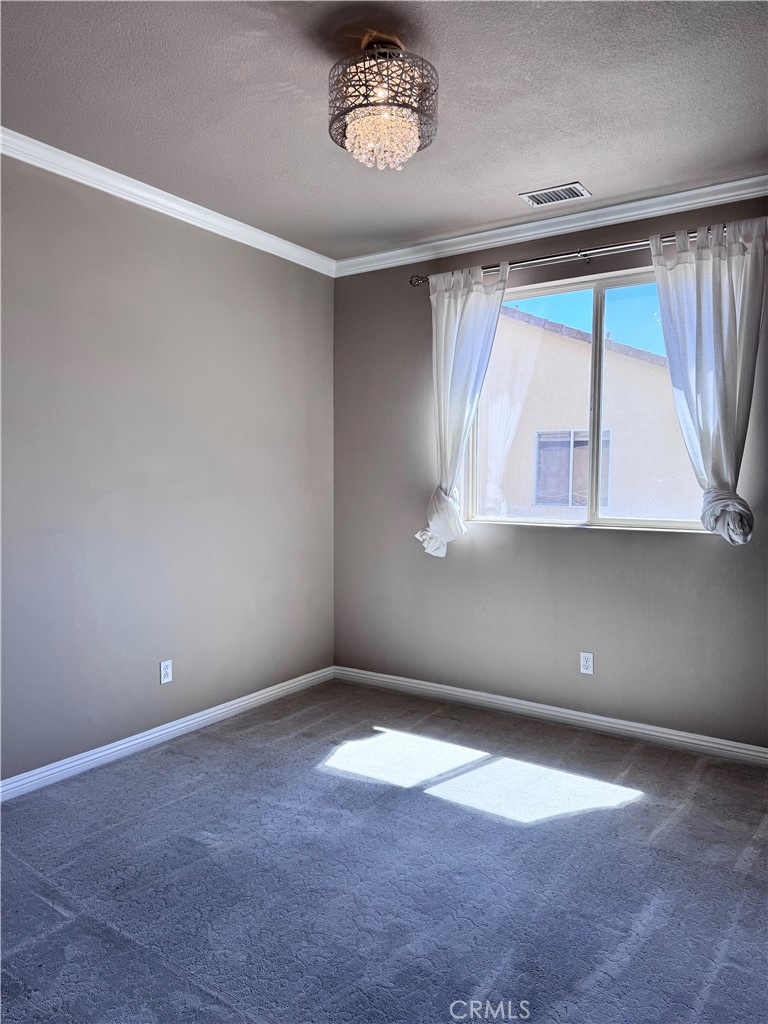 28463 Cascade Road Castaic, CA 91384 - Photo 23 of 29 wooden floor in an empty room with a window