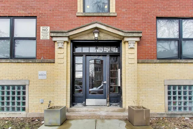 a front view of a house with a outdoor space