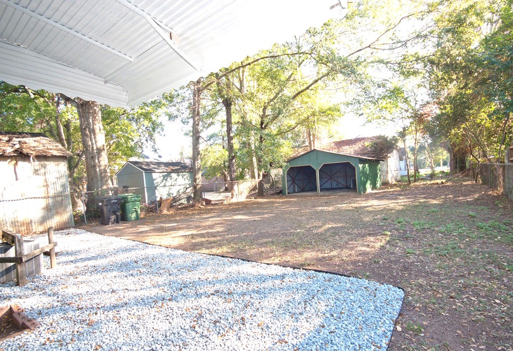 108 27th Street Columbus, GA 31904 - Photo 25 of 26 a view of a house with a yard and tree s