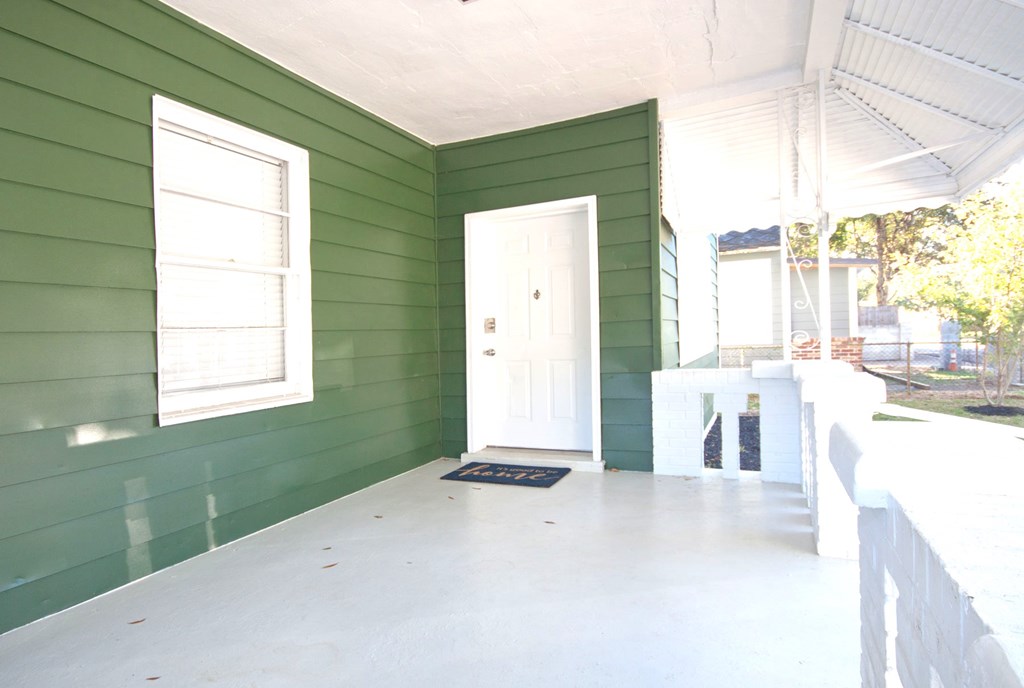 108 27th Street Columbus, GA 31904 - Photo 5 of 26 a view of a kitchen with a sink and a large window