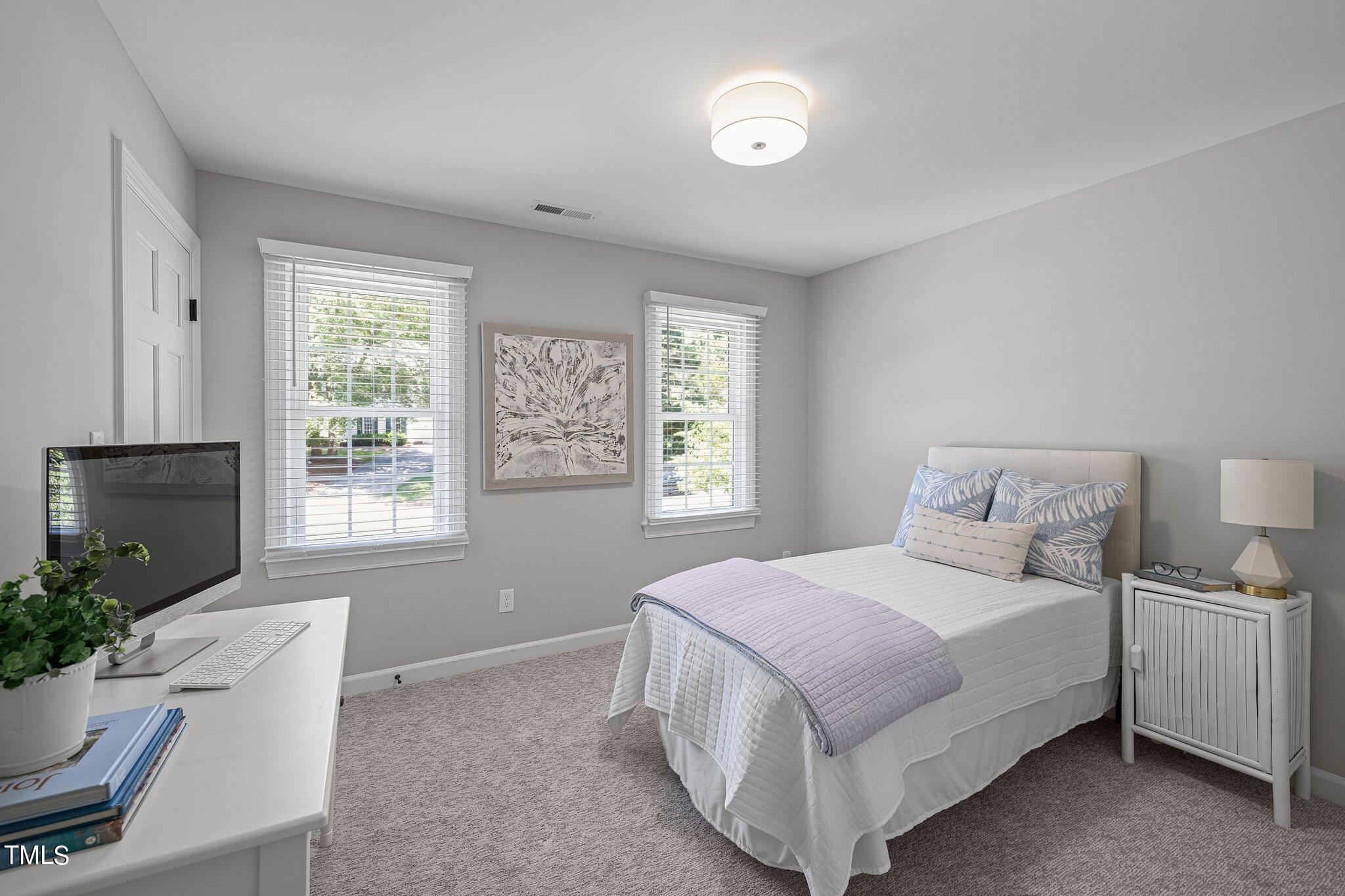 1113 Winterwind Place Raleigh, NC 27615 - Photo 33 of 49 Bedroom 3 (Walk-up attic access in this room)