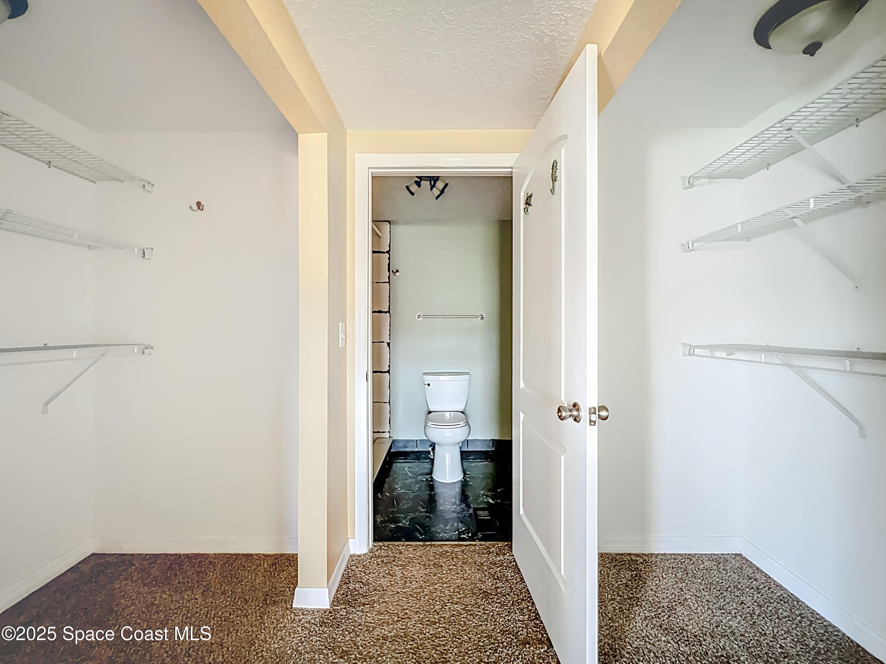 425 Baker Road Merritt Island, FL 32953 - Photo 17 of 27 a view of a bathroom with a sink