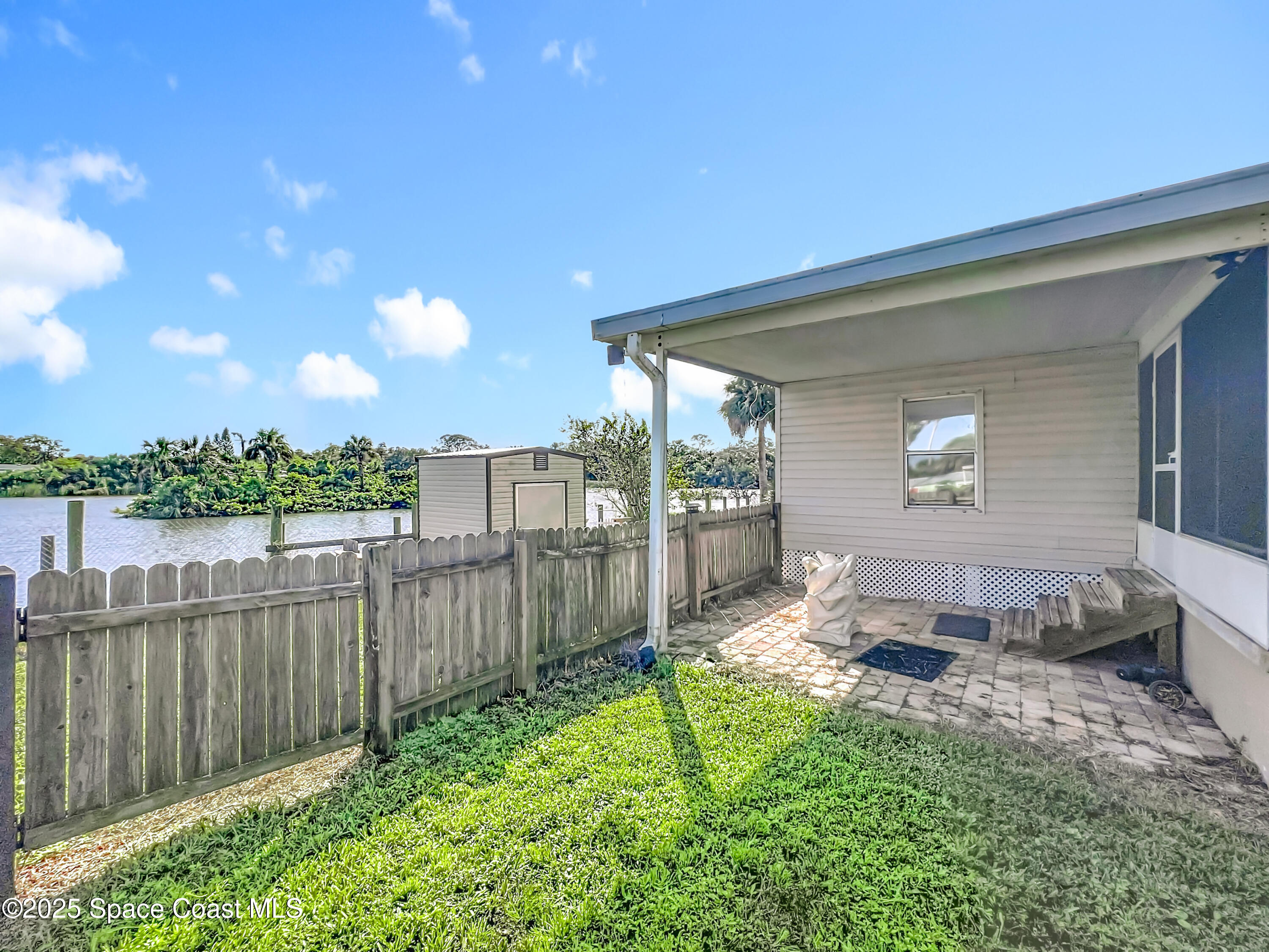 425 Baker Road Merritt Island, FL 32953 - Photo 23 of 27 a house view with a backyard space