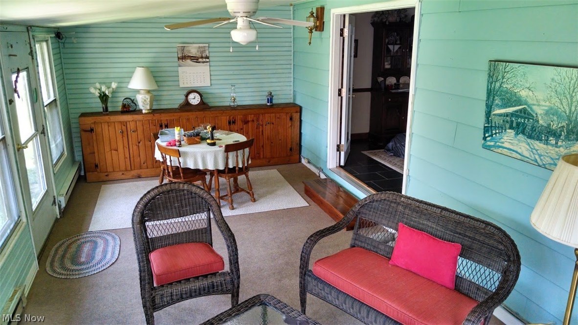 2376 Haines Road Madison, OH 44057 - Photo 22 of 30 Opened French doors. This is how the sun room looked before the owner moved.