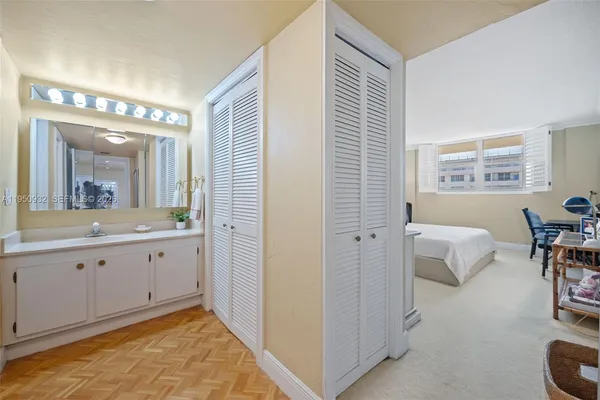 a bathroom with a toilet and a tub